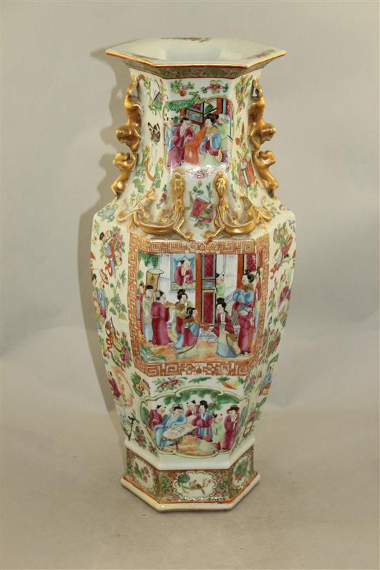 A Chinese Canton-decorated famille rose hexagonal baluster vase, mid 19th century, 44cm, slight restorations